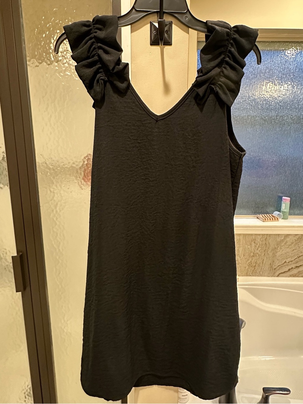 Little black dress with ruffle detail